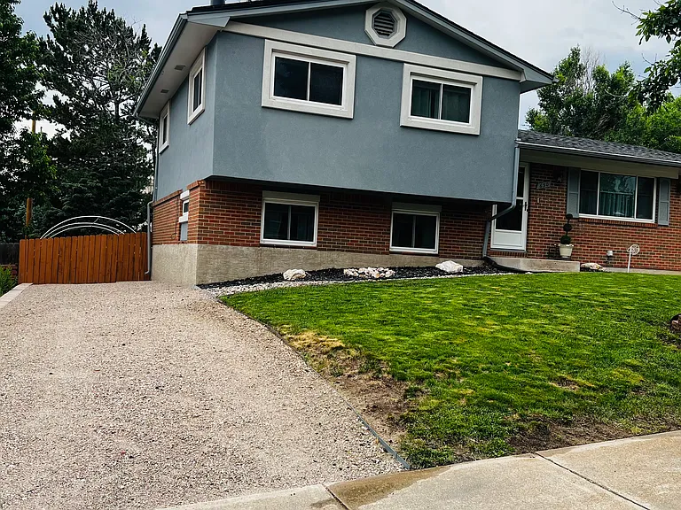 Additional driveway providing extra parking space for guests and longer stays.