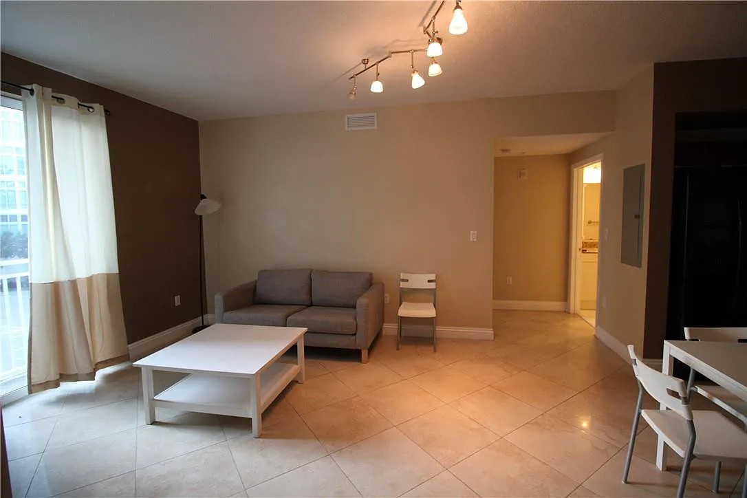 Building Photo - 7275 SW 90th Way #211