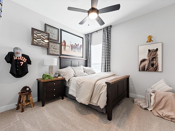 Spacious secondary bedrooms are located throughout the home.