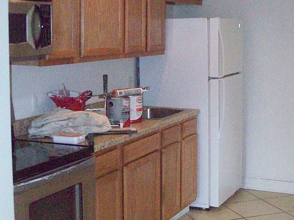 Nice kitchen with stainless microwave & stove
