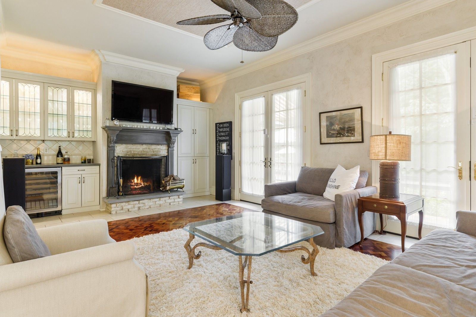  ENTERTAINMENT ROOM WITH FIREPLACE, WET BAR, WINE COOLER AND FRENCH DOORS TO POOL