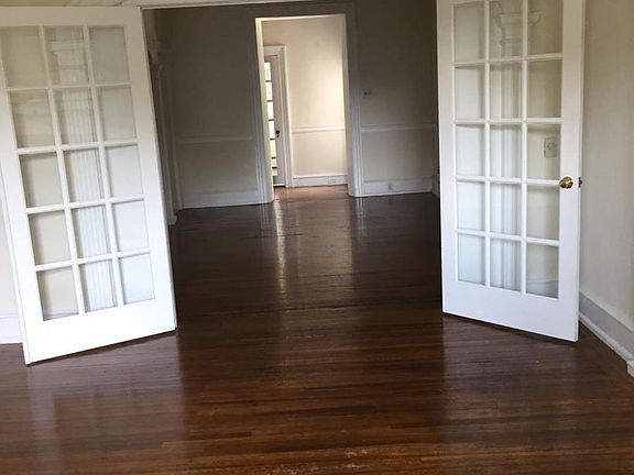 Large living room with lots of natural light.