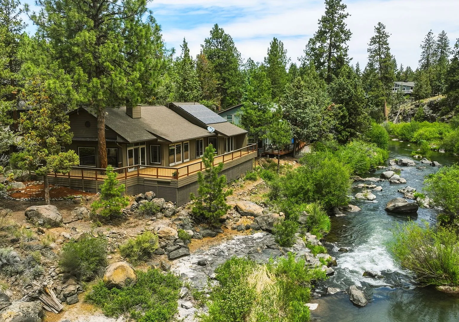 Exceptional Three Bedroom Riverfront Retreat in Northwest Bend — Photo 1