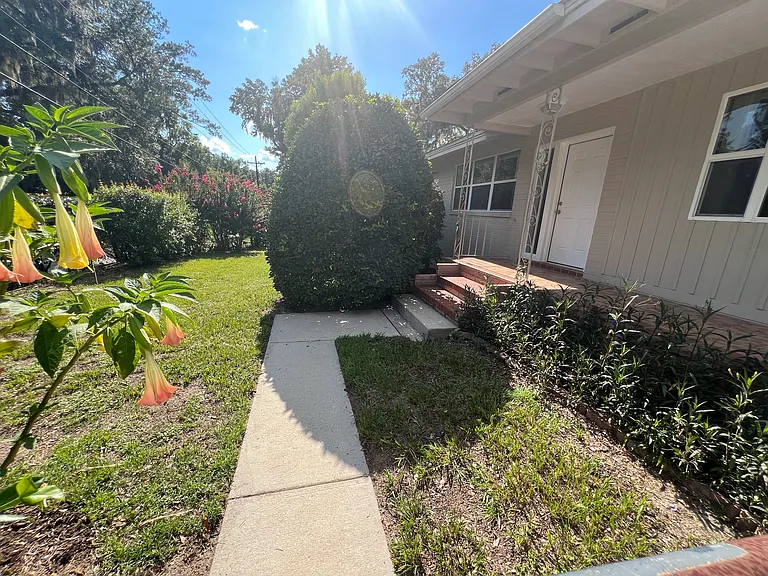 Front yard gated access to front door entrance