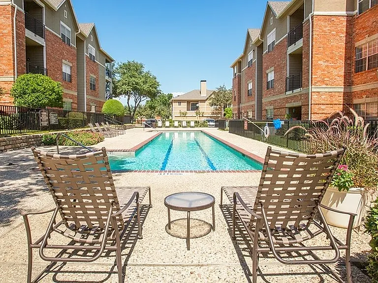 Embrace leisure at our tranquil apartment pool