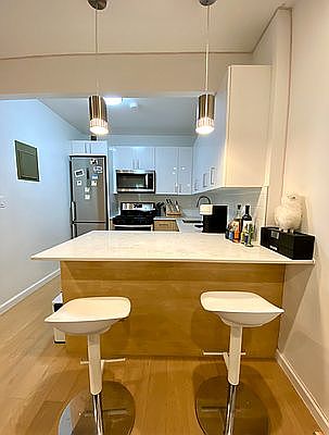 4th image of 214 E 9th St APT 3C