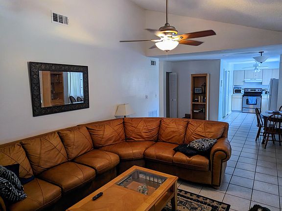 Living room with view to kitchen