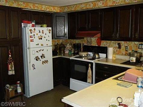 Kitchen and part of counter into Dining area