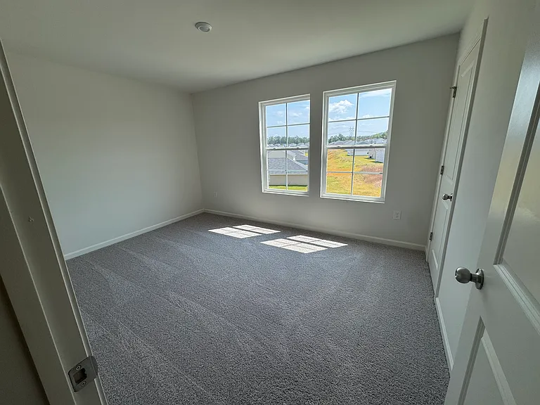 Bed room with large window
