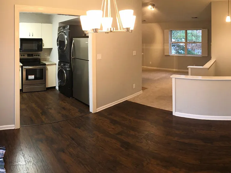 Panoramic of dining/living/kitchen