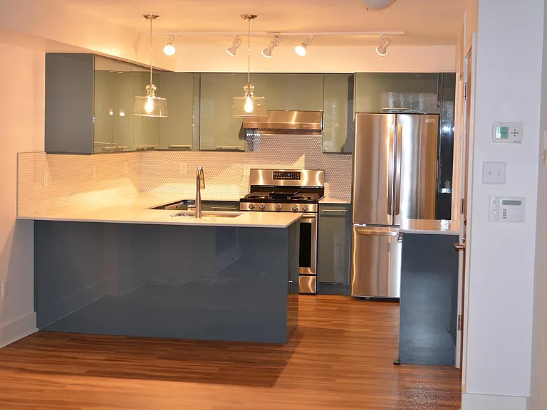 Kitchen with countertop dining - walk-in utility close with W/D in far right corner