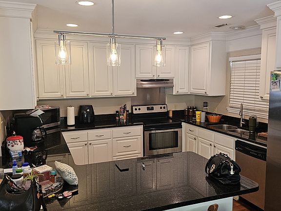 Kitchen in center of house