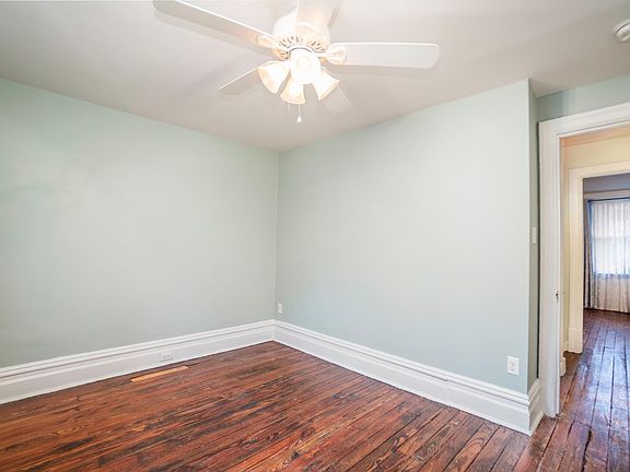 bedroom with ceiling, fan and light