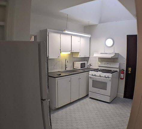 Kitchen view, (from bedroom).