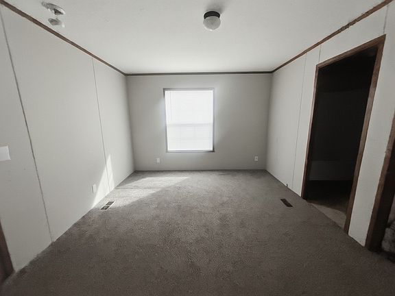 Master Bedroom adjacent to Kitchen