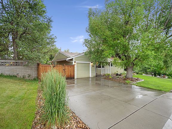 Oversized driveway with a 1-car garage.