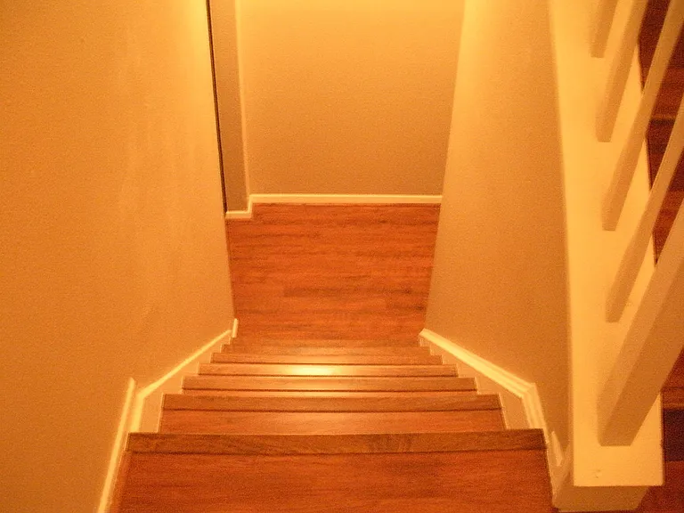 Head downstairs for private living area with wood burning fireplace, master bedroom with door to backyard, bathroom and door to garage. Would also make a nice game room.