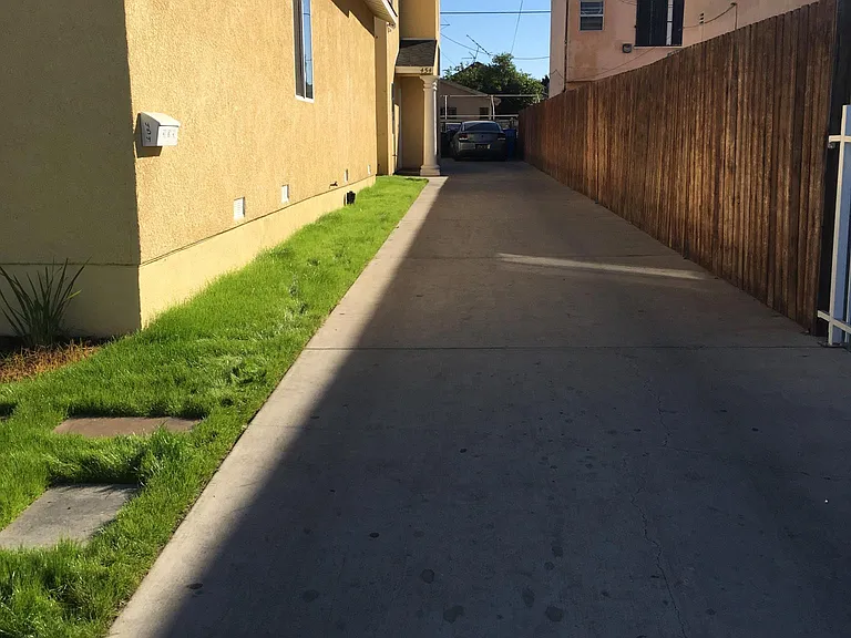 Driveway to back house and garage