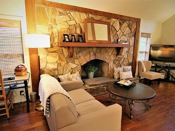 Raised hearth wood-burning fireplace