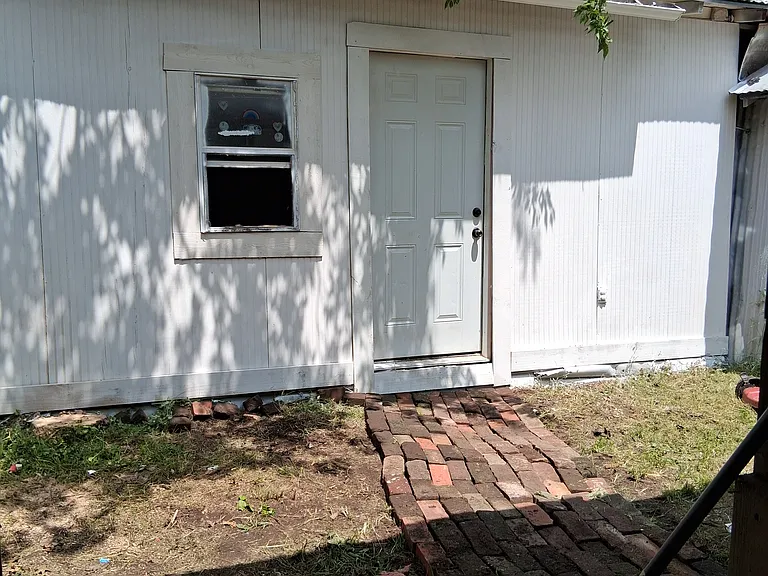 "bonus" building in back yard. approximately 24 feet by 12 feet. 2 rooms, wired for electricity. use for she shed, crafts, exercise etc. NOT for use as bedrooms.