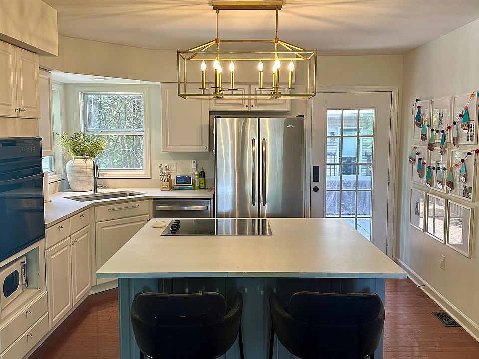 Kitchen with large windows and huge island