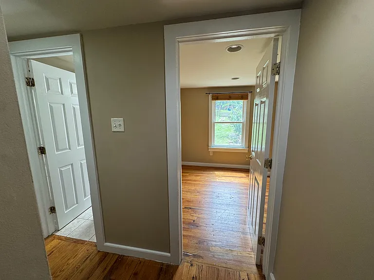 Hallway of 2nd floor landing, looking at Bathroom and Office Doors