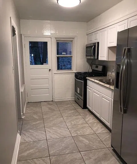 Kitchen with stainless steel appliances