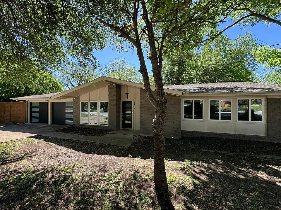 Mid-Century modern curb appeal. Large lot with plenty of shade.