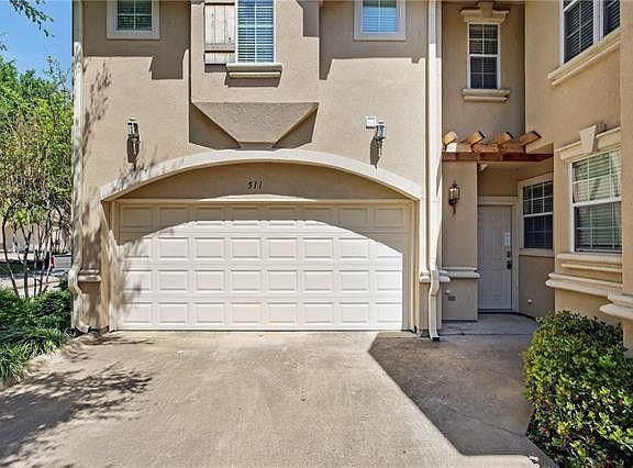 Sunny townhouse with 2 floors, 3 bedrooms, 2.5 baths and 2 car garage.