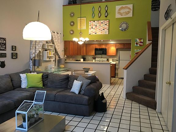 Open plan living space with living room, dining room and kitchen.