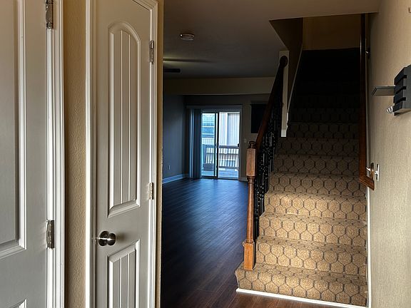 Main Floor, picture from front door. Door to the far left leads to garage. Smaller full door is coat closet