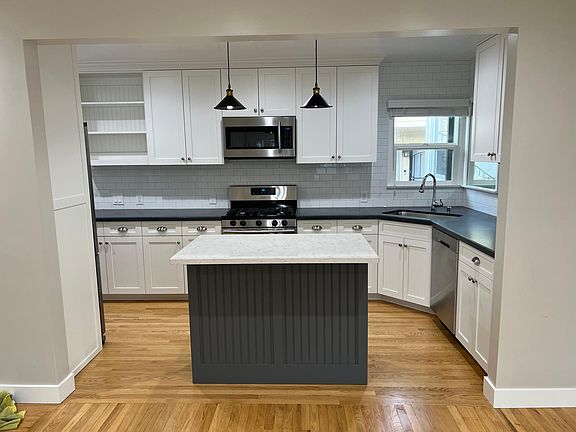 Living room into kitchen view.