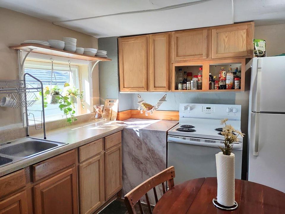 Eat in kitchen with appliances