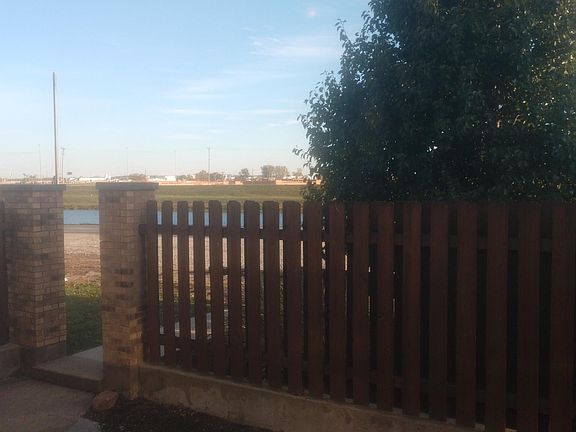 Outside entry looking towards river & bikeway.