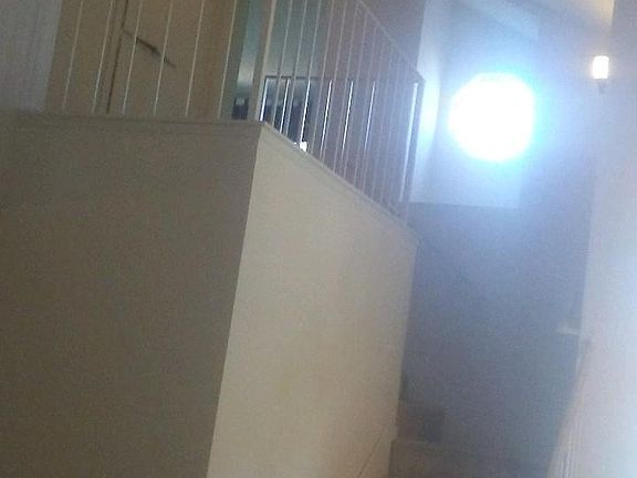 Carpeted stairway leading to both upstairs bedrooms, each with seperate bathroom.