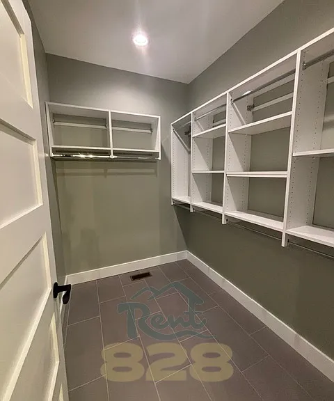 primary bedroom walk-in closet