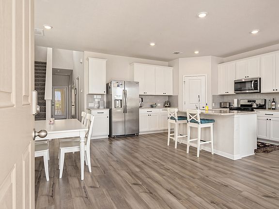 Open concept living, dining and kitchen