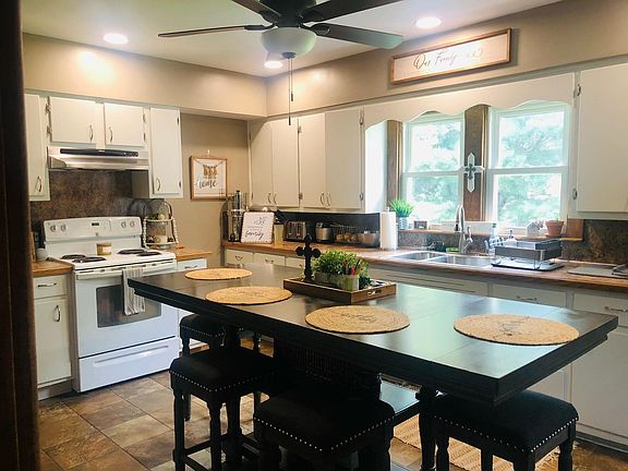 View of kitchen from side entry door.