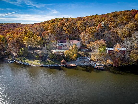 Wow!  Just wow.  This property has so much to offer.  Three docks and an outbuilding are just a couple to mention.