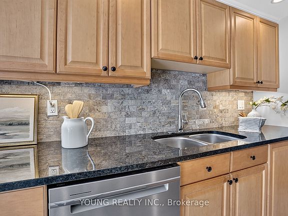 5th image of 712 Rossland Rd E #203