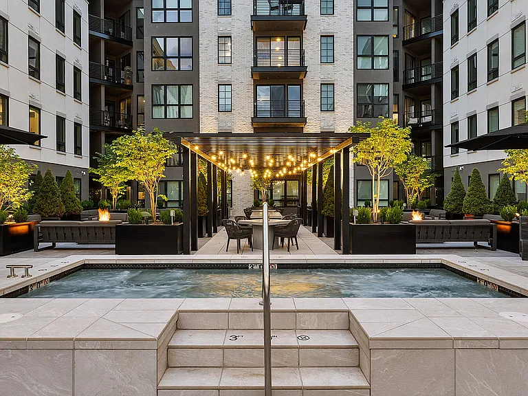 Cozy rooftop hot tub with ambient lighting