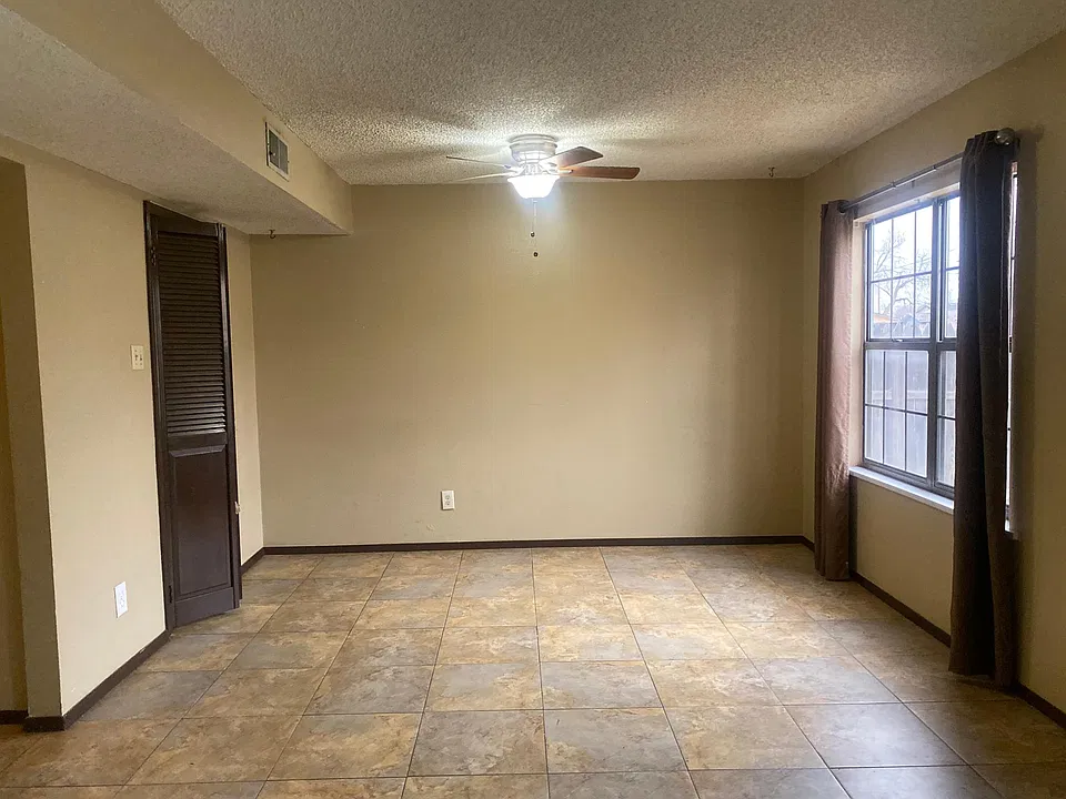 dinning area with doors to kitchen