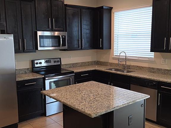 4th image of 9637 Silver Buttonwood St