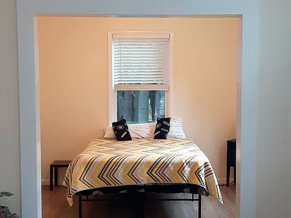 Bedroom is 12 x12 has beautiful stained glass between bedroom and living room. FullMaster bath with 5 foot marble shower.large master closet .plus extra full walk on closet off livingroom