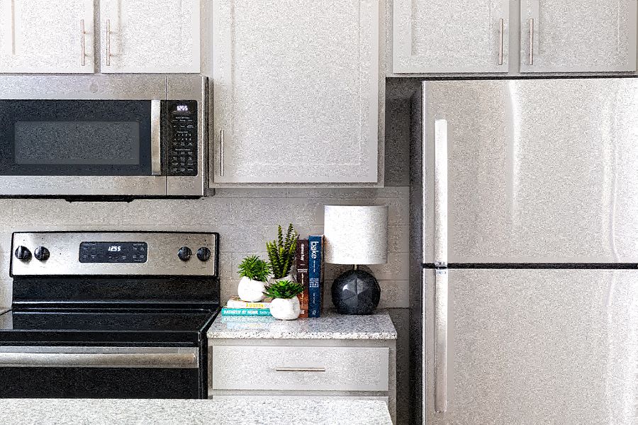 Kitchens with premium granite countertops and stainless steel appliances