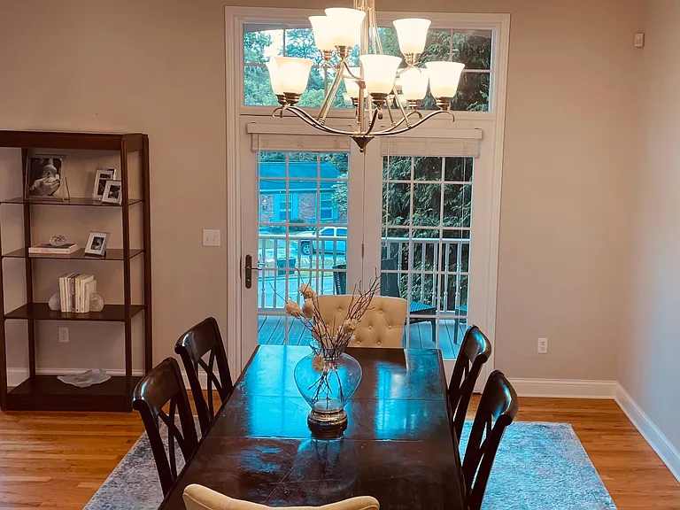 Formal dining area with crown molding and timeless architectural detail