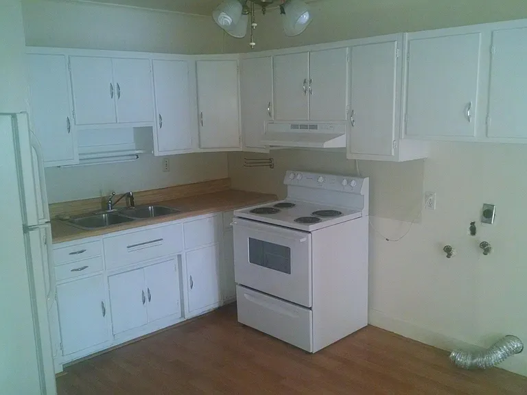 Kitchen, Space for Washer/Dryer. Lots of Cabinets.