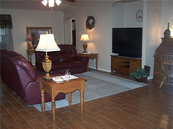    Another view of the family room.High Ceilings and great ceiling fan.