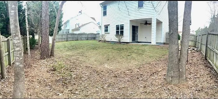 Fenced backyard with lock