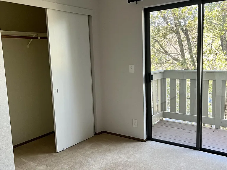 Second bedroom with private balcony